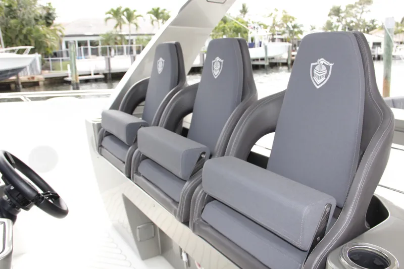 Slide: The Image of Luxury seating on 2023 Canados 493 Gladiator yacht, featuring sleek design and premium materials. - 9