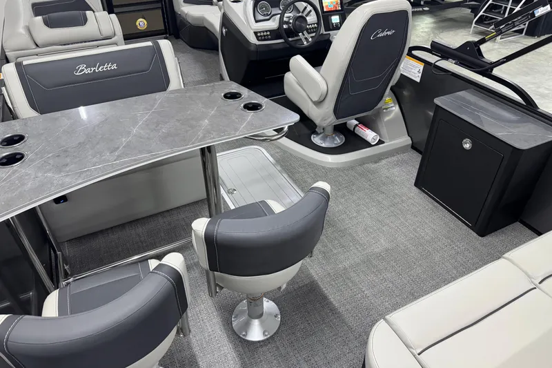 Slide: The Image of 2026 Barletta Cabrio 24UE interior with modern seating and sleek design. - 14
