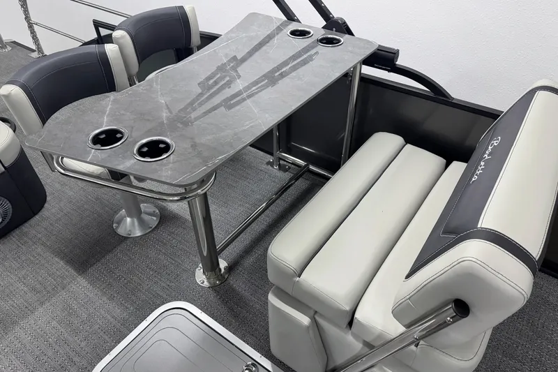 Slide: The Image of Luxurious interior of 2026 Barletta Cabrio 24UE with elegant seating and table design. - 18