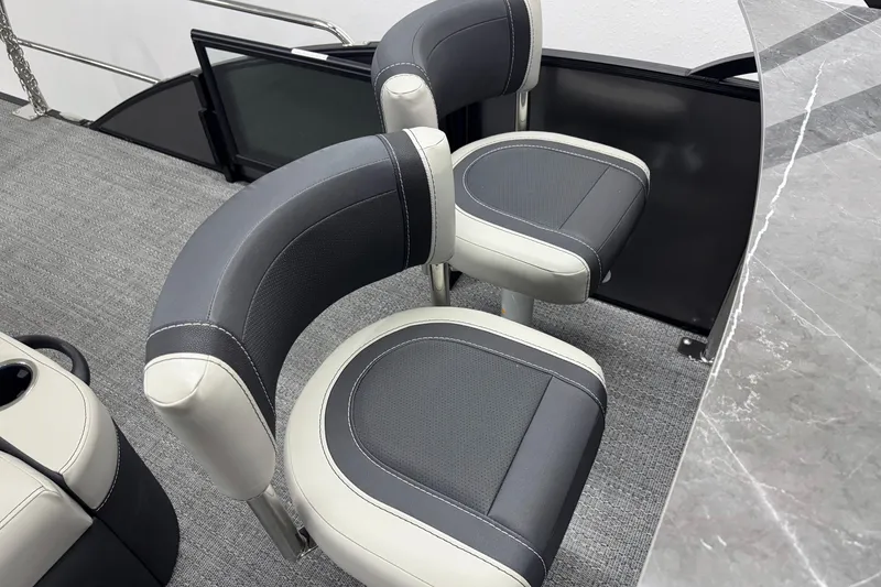 Slide: The Image of 2026 Barletta Cabrio 24UE boat interior with stylish seating and modern design. - 19