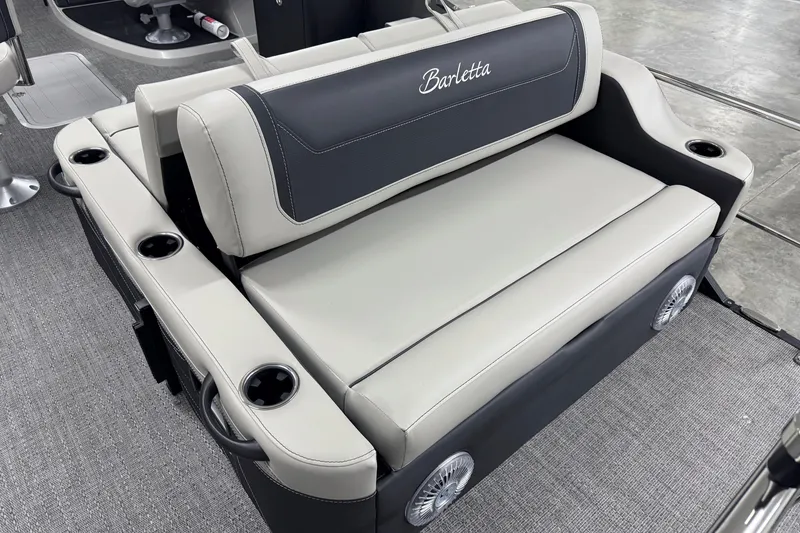 Slide: The Image of 2026 Barletta Cabrio 24UE boat seating with cup holders and sleek design. - 4