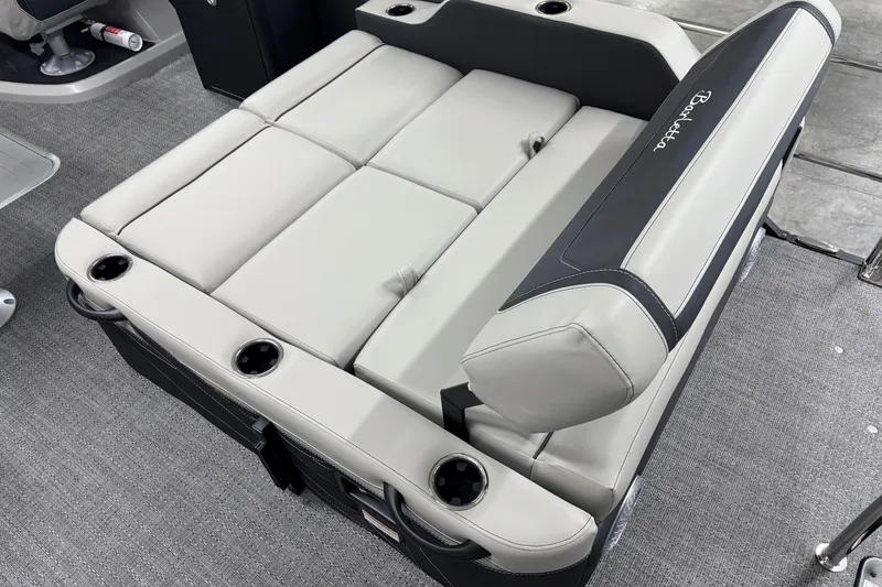 Slide: The Image of 2026 Barletta Cabrio 24UE boat seating with cup holders and sleek design. - 6