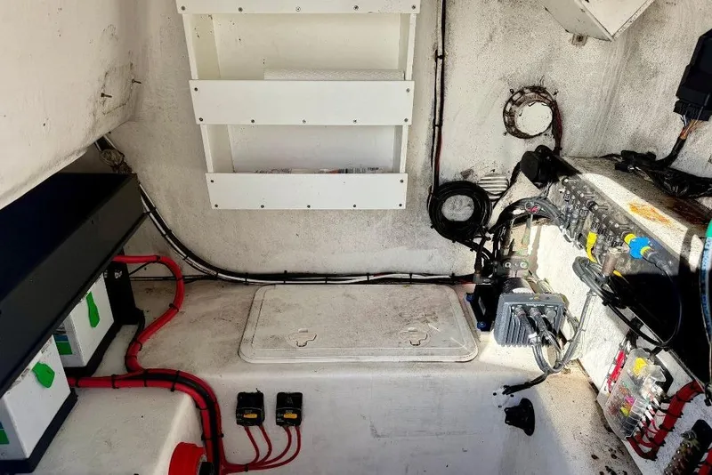 Slide: The Image of 2007 Cape Horn 24 OS boat interior wiring and battery setup. - 11