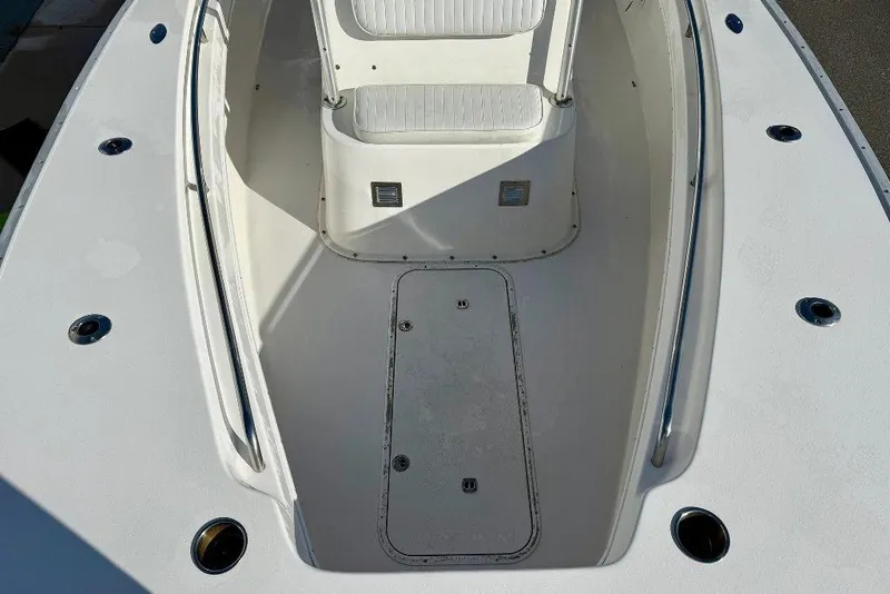 Slide: The Image of 2007 Cape Horn 24 OS boat deck with seating and storage compartments. - 7