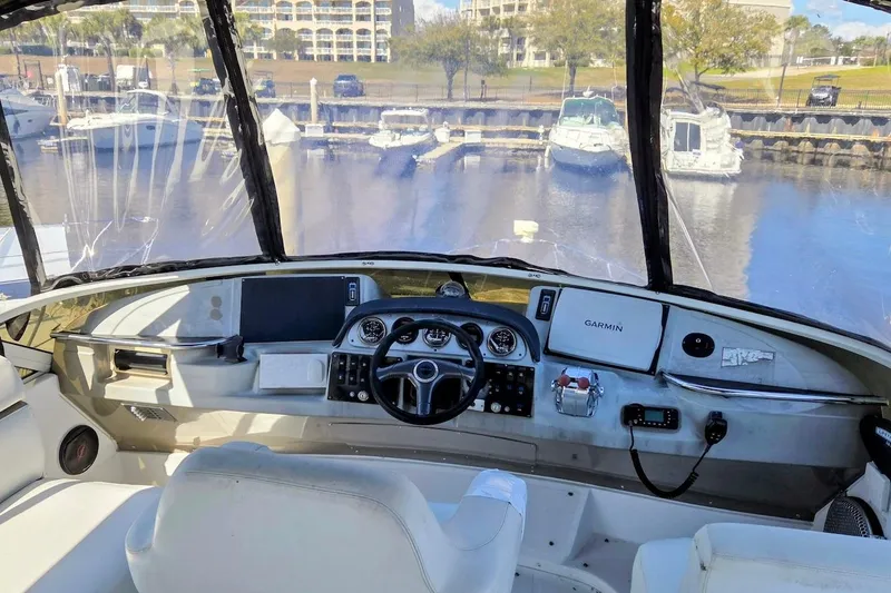 Slide: The Image of Cockpit view of 2000 Carver 396 Motor Yacht with Garmin navigation system. - 13