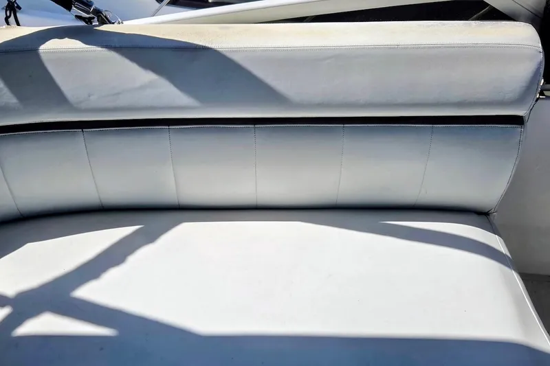 Slide: The Image of White leather seating on a 2000 Carver 396 Motor Yacht, showcasing luxury and comfort. - 18