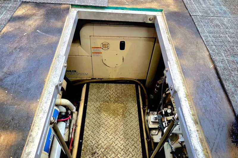 Slide: The Image of Engine compartment of 2000 Carver 396 Motor Yacht with Kohler power system. - 59