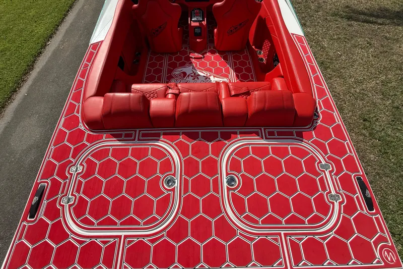 Slide: The Image of Red interior of 2020 HellKats 30 boat with hexagonal pattern design. - 19