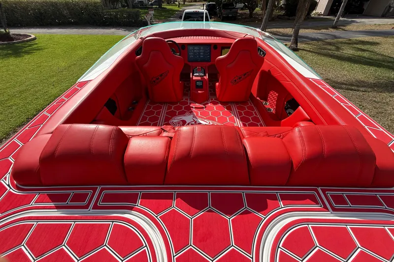 Slide: The Image of Red interior of 2020 HellKats 30 boat with hexagonal pattern design. - 21