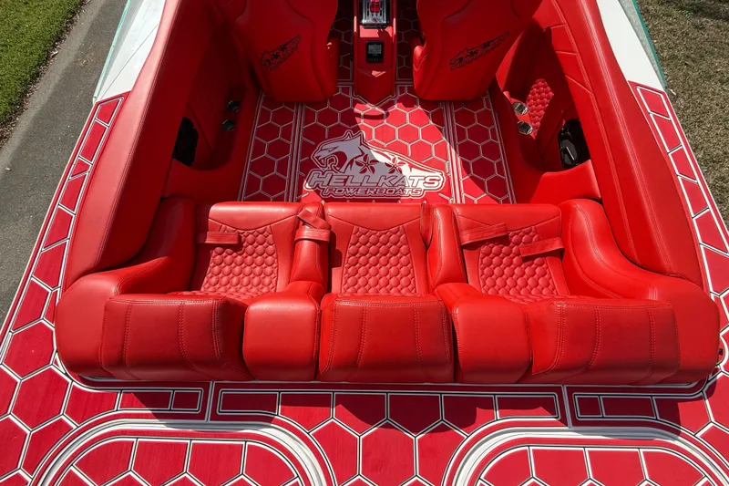 Slide: The Image of Red interior of 2020 HellKats 30 powerboat with hexagonal pattern and logo. - 22