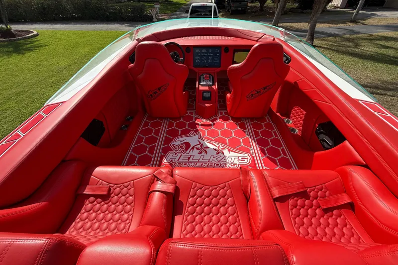 Slide: The Image of Red interior of 2020 HellKats 30 powerboat with logo and honeycomb pattern. - 23