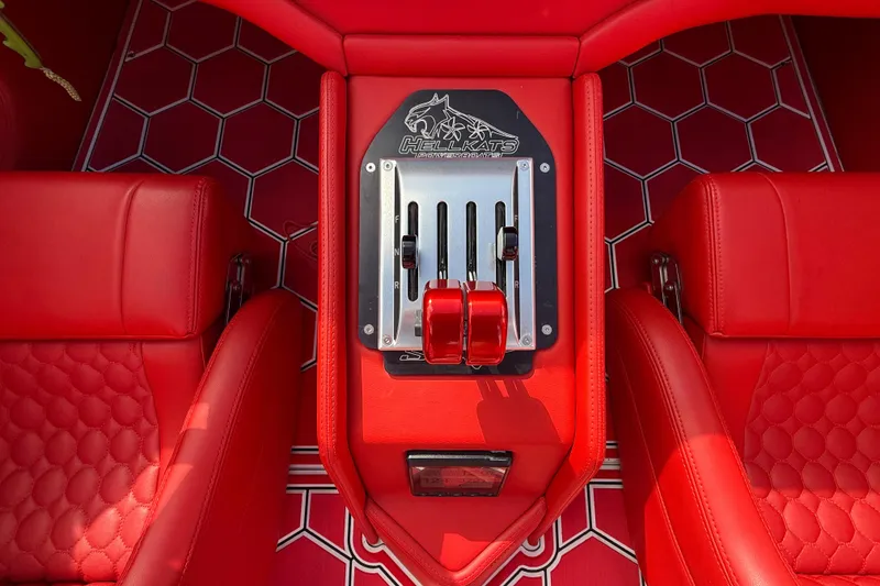 Slide: The Image of Red HellKats 30 boat interior with hexagonal flooring and control panel, 2020 model. - 34