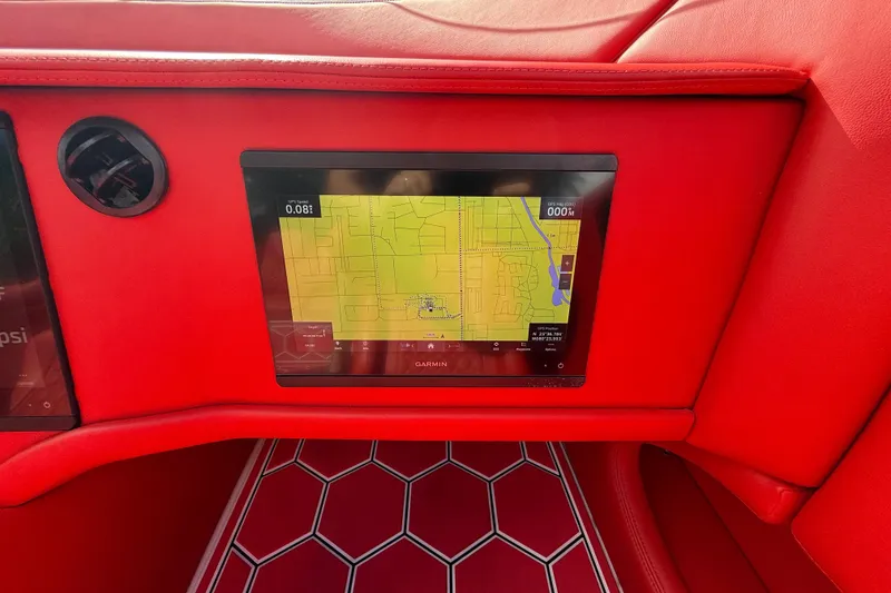 Slide: The Image of Red interior of 2020 HellKats 30 with GPS navigation display. - 36