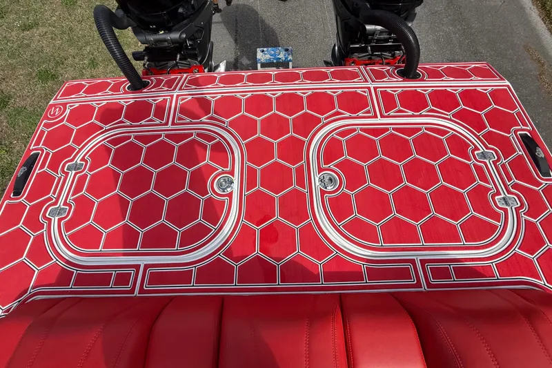 Slide: The Image of Red hexagonal-patterned deck of 2020 HellKats 30 boat with dual engines. - 43
