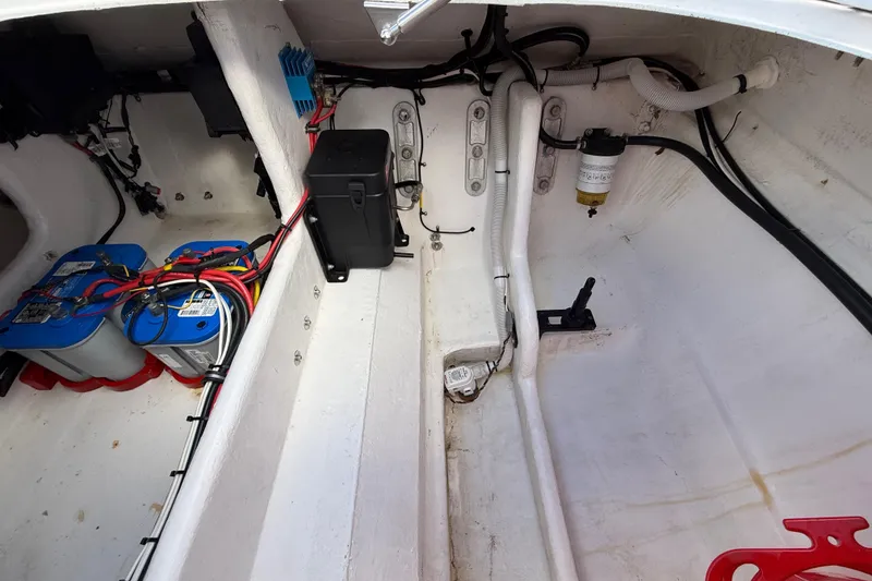 Slide: The Image of Interior of a 2020 HellKats 30 boat showing battery setup and wiring. - 46