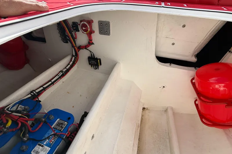 Slide: The Image of Interior view of a 2020 HellKats 30 boat showing wiring and components. - 54
