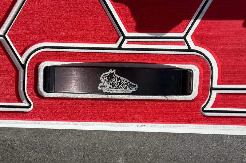 Slide: The Image of Red HellKats Powerboats logo on 2020 HellKats 30 model. - 55