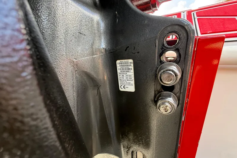 Slide: The Image of Close-up of HellKats 30, 2020 model, showing bolts and a label on a metal surface. - 60