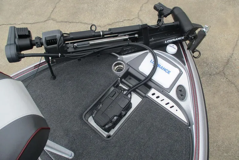Slide: The Image of Triton 19 TrX Patriot 2026 boat deck with Lowrance equipment and foot pedal. - 6