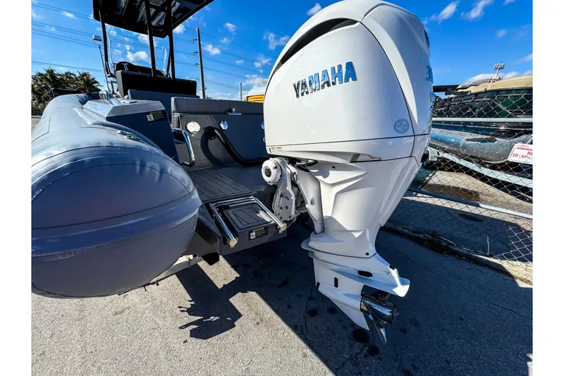 Slide: The Image of 2024 Northstar Orion 8 boat with Yamaha outboard motor, docked under clear blue sky. - 3