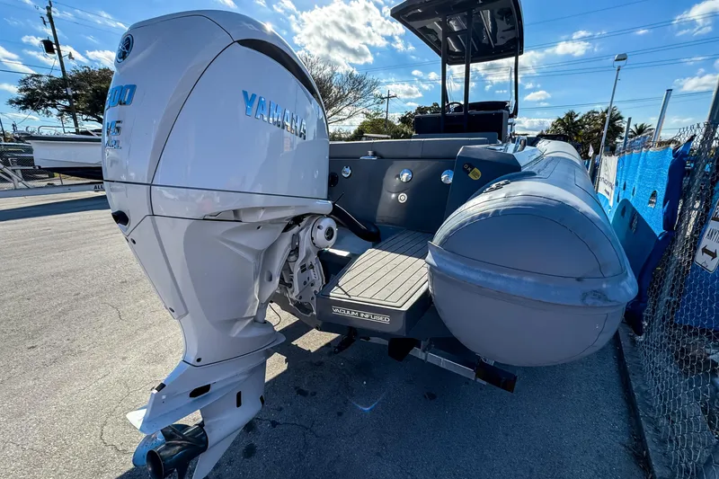 Slide: The Image of 2024 Northstar Orion 8 boat with Yamaha outboard motor, docked under clear sky. - 4