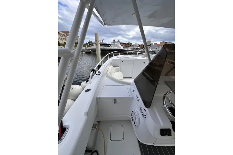 Slide: The Image of 1996 Itrepid 35 Cuddy boat interior, featuring sleek design and modern amenities. - 6