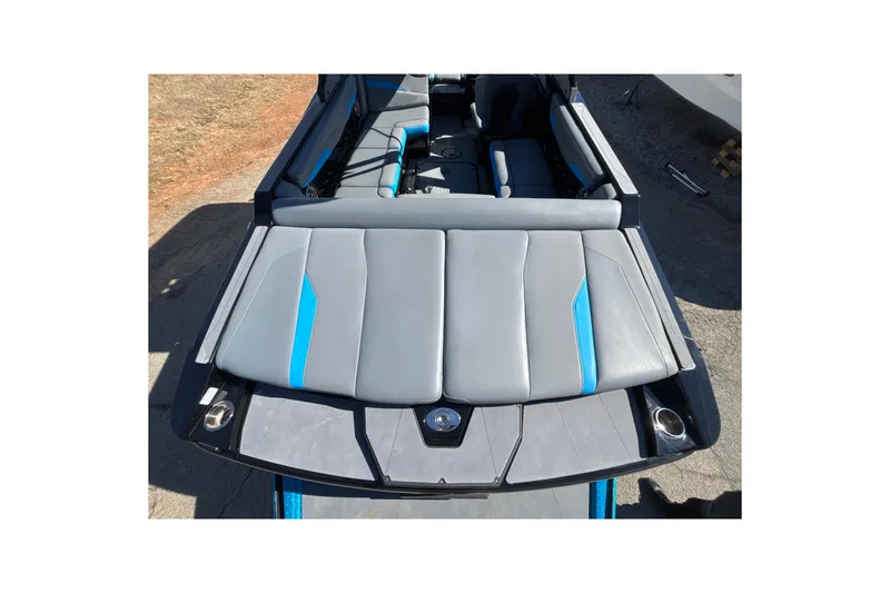 Slide: The Image of 2023 Axis T220 boat interior with gray and blue seating, viewed from above. - 25