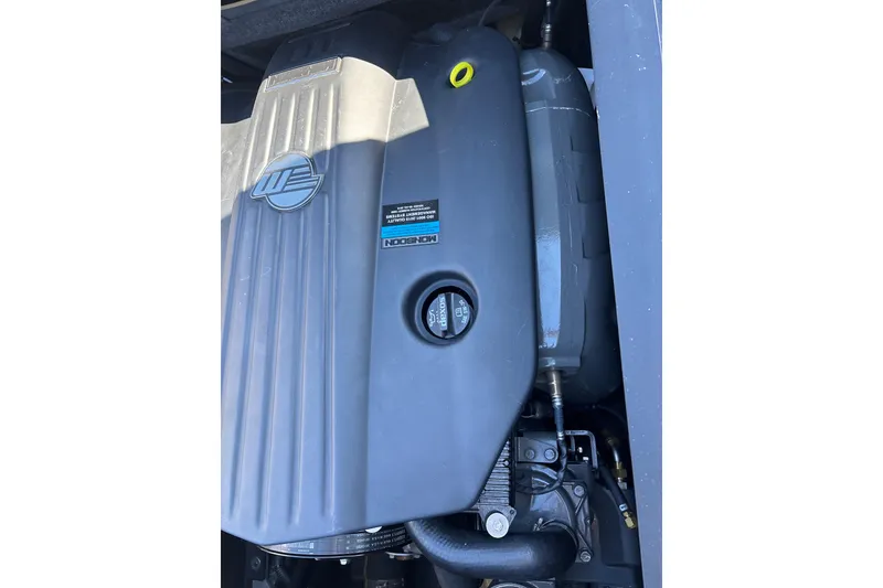 Slide: The Image of 2023 Axis T220 engine close-up with Monsoon branding. - 26