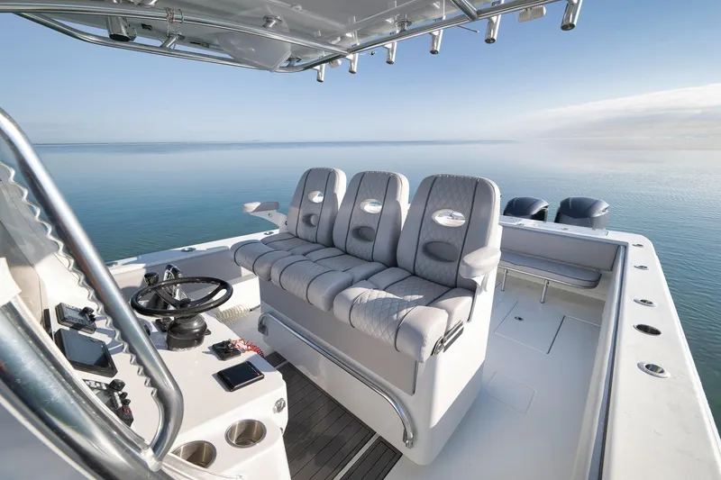 Slide: The Image of 2021 Contender 39 ST boat interior with luxurious seating and ocean view. - 20