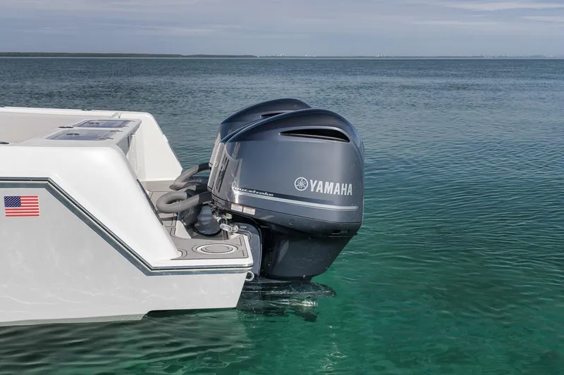 Slide: The Image of 2021 Contender 39 ST boat with Yamaha outboard engine on clear water. - 30