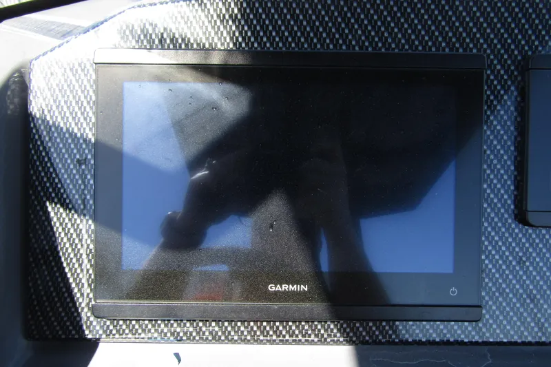 Slide: The Image of Garmin display on 2024 Northstar Orion 8 dashboard with carbon fiber finish. - 19