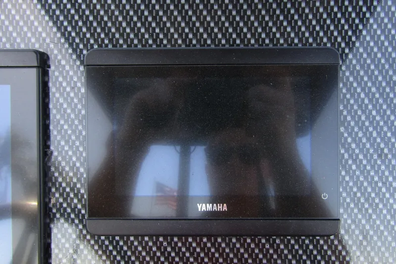 Slide: The Image of Carbon fiber dashboard with Yamaha display on Northstar Orion 8, 2024 model. - 20
