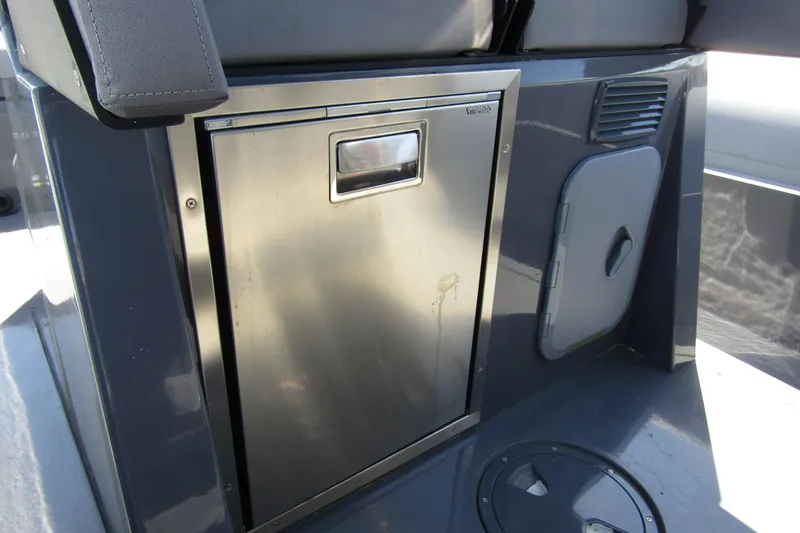 Slide: The Image of 2024 Northstar Orion 8 boat interior with stainless steel storage compartment. - 30