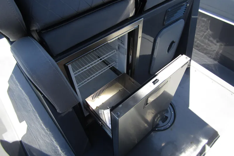Slide: The Image of Open refrigerator in 2024 Northstar Orion 8 boat interior. - 31