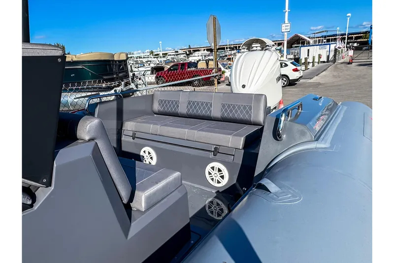 Slide: The Image of 2024 Northstar Orion 8 boat on trailer outside Nautical Ventures store. - 5