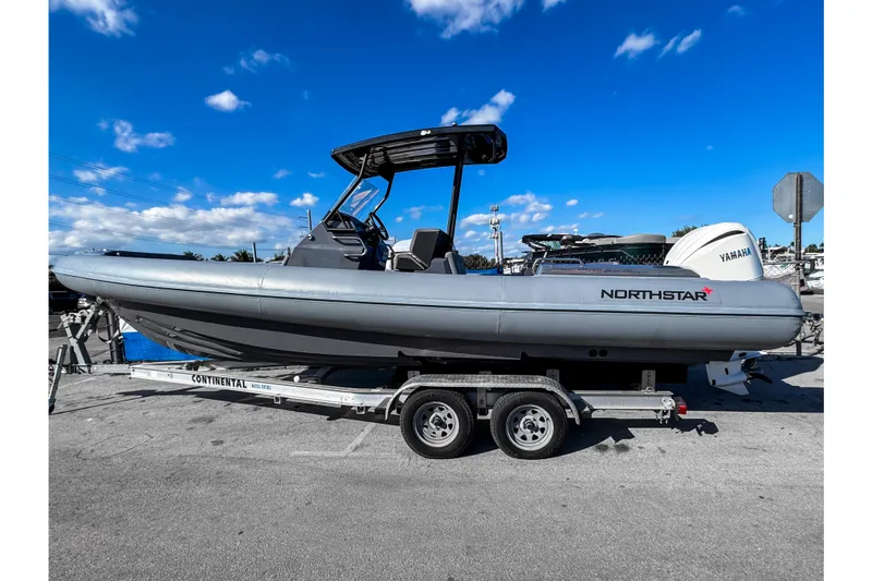 The Image of 2024 Northstar Orion 8 boat on trailer under clear blue sky. - 0