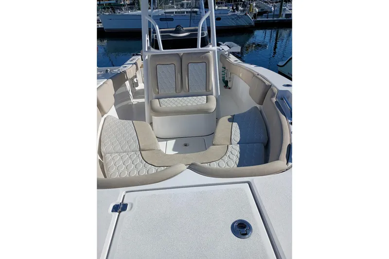Slide: The Image of 2021 Sea Fox 228 Commander boat interior with cushioned seating and sleek design. - 12