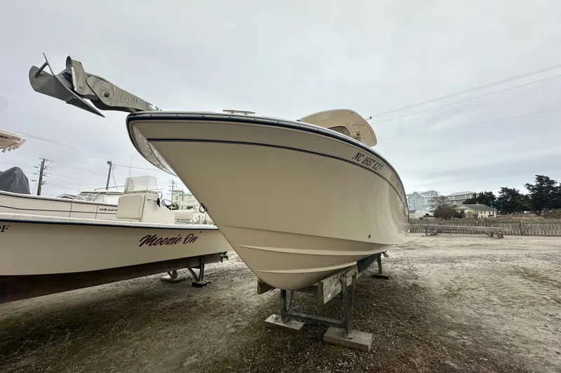 Slide: The Image of 2023 Grady-White Fisherman 257 boat on display, side view, outdoors. - 5