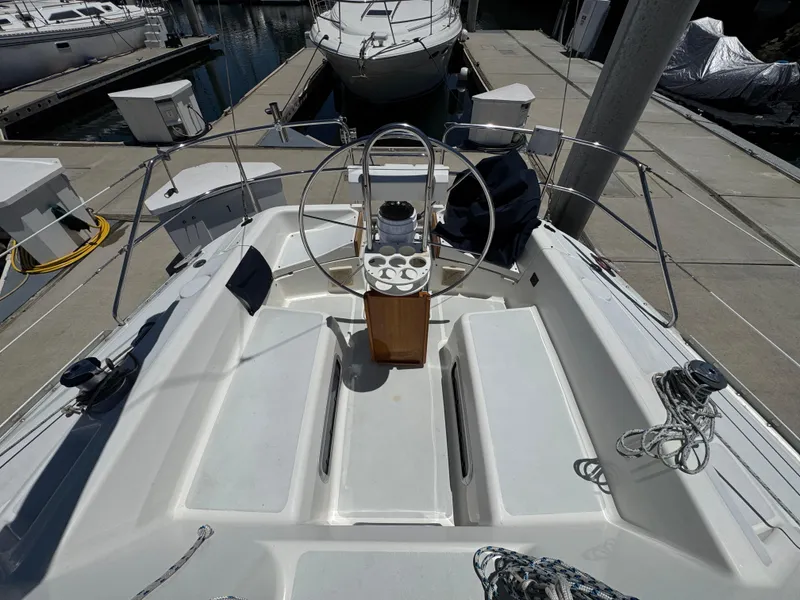 Slide: The Image of Cockpit of 1992 Hunter Legend 375 sailboat docked at marina. - 11