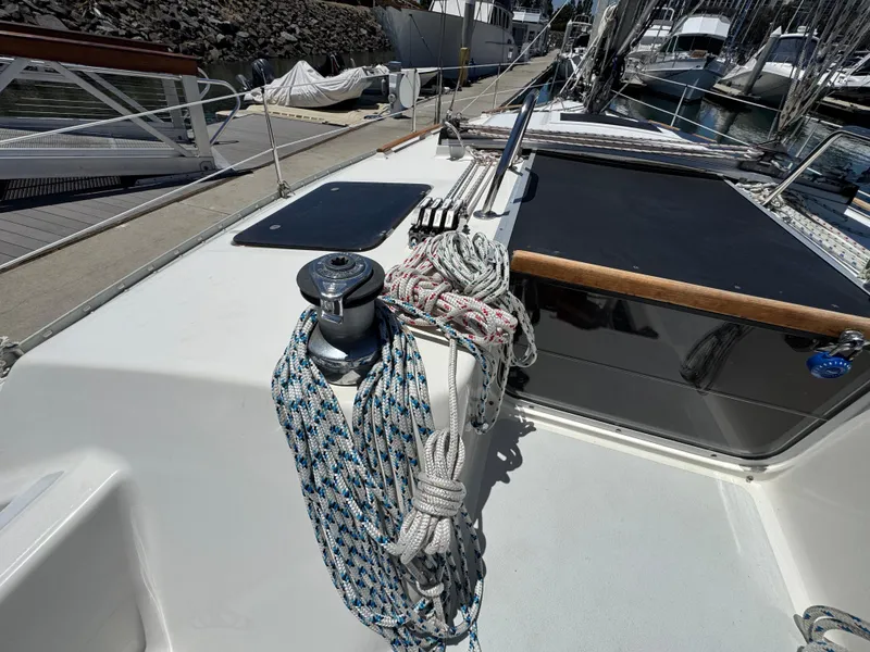 Slide: The Image of Deck of 1992 Hunter Legend 375 sailboat with ropes and winch. - 12
