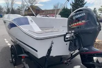 Slide: The Image of 2023 Starcraft SVX 171 OB boat with Yamaha outboard motor on a trailer. - 4