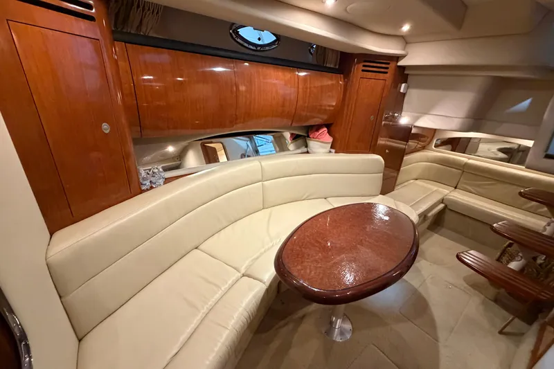Slide: The Image of Luxurious interior of 2005 Sea Ray 360 Sundancer yacht with elegant seating and wooden finishes. - 34
