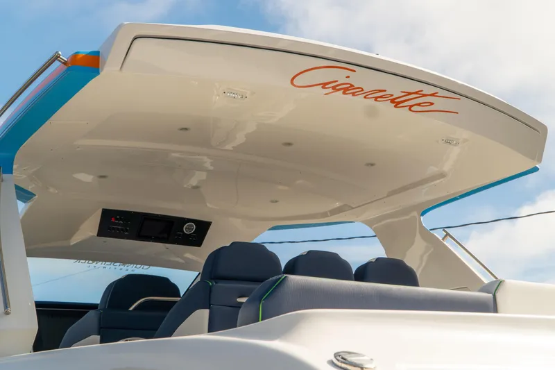 Slide: The Image of 2023 Cigarette 41' Nighthawk boat with sleek design and modern seating. - 4