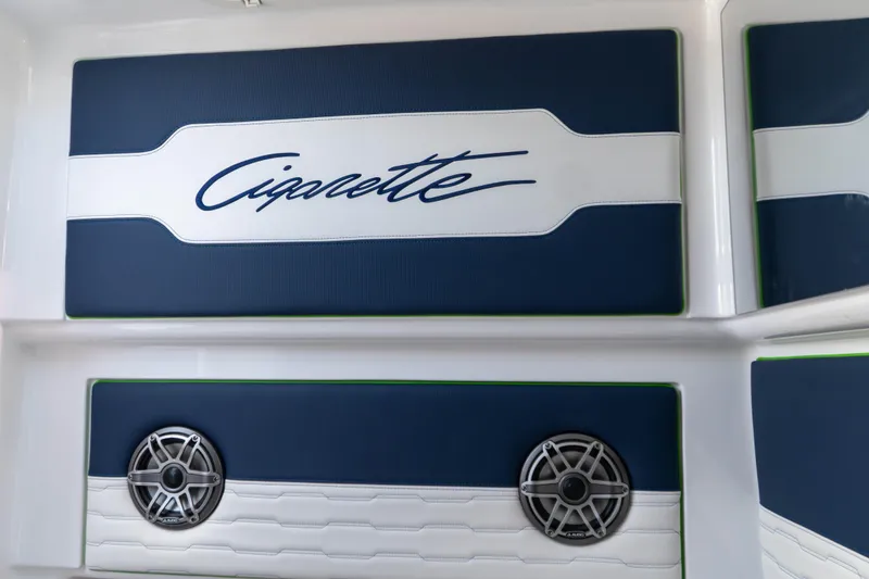 Slide: The Image of 2023 Cigarette 41' Nighthawk interior with branded upholstery and speaker system. - 7