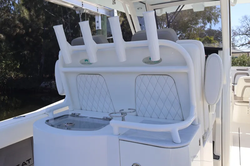 Slide: The Image of 2022 World Cat 280 CC-X boat interior with rod holders and seating. - 15