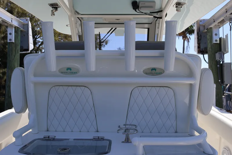 Slide: The Image of 2022 World Cat 280 CC-X boat interior with rod holders and storage compartments. - 21