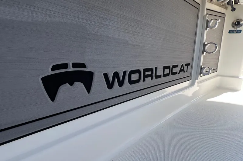 Slide: The Image of 2022 World Cat 280 CC-X boat interior with logo detail. - 22