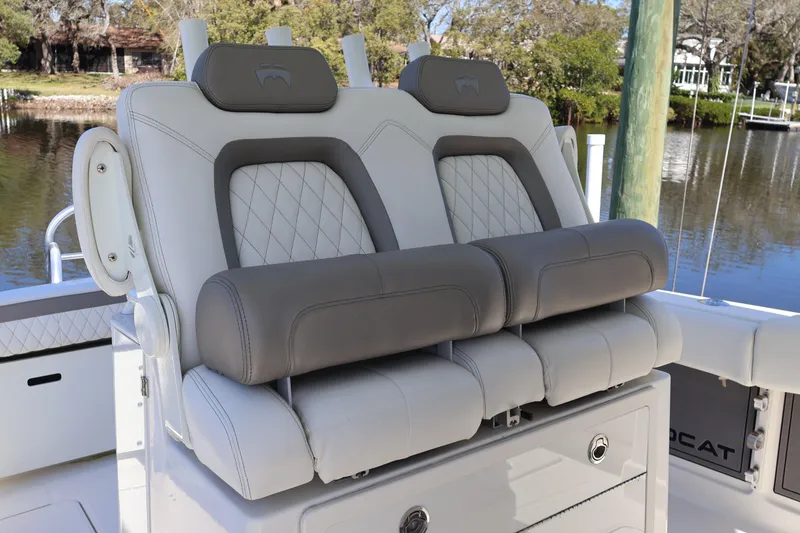 Slide: The Image of 2022 World Cat 280 CC-X boat seating with luxurious gray and white upholstery. - 24