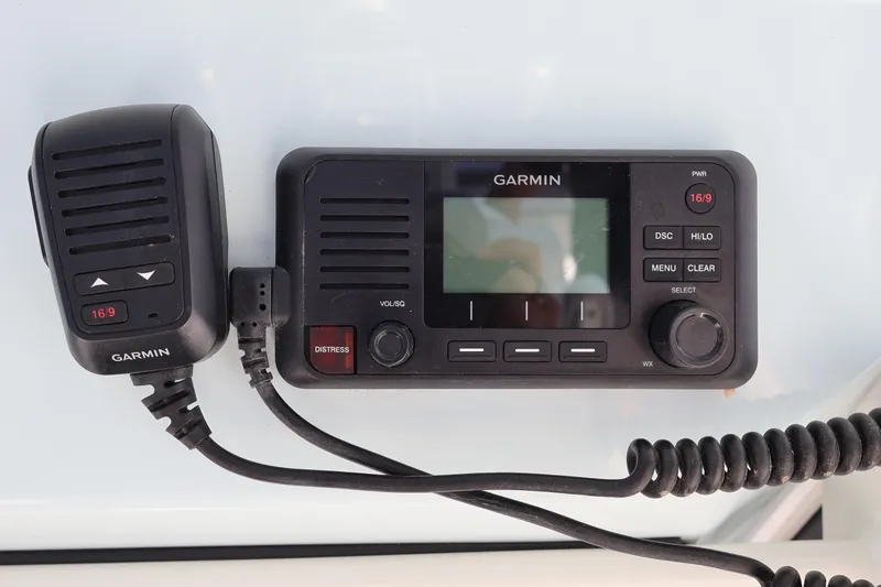 Slide: The Image of Garmin marine radio system on 2022 World Cat 280 CC-X boat dashboard. - 29