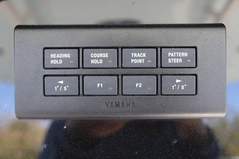 Slide: The Image of Control panel of a 2022 World Cat 280 CC-X boat with navigation buttons. - 30